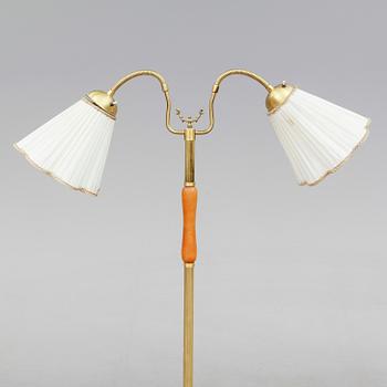 GOLVLAMPA, Pagos, 1900-talets mitt.