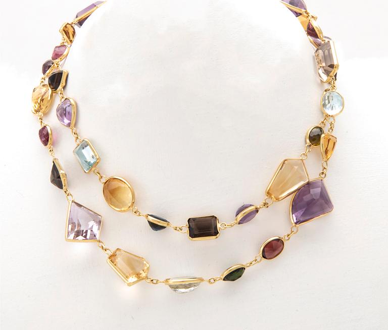 An 18K gold necklace set with various faceted gemstones, possibly H.Stern.