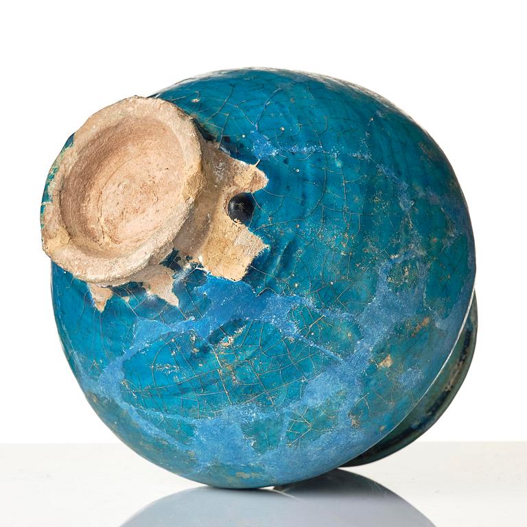 A turquoise Keshan pottery vase, central Persia, 13th century.