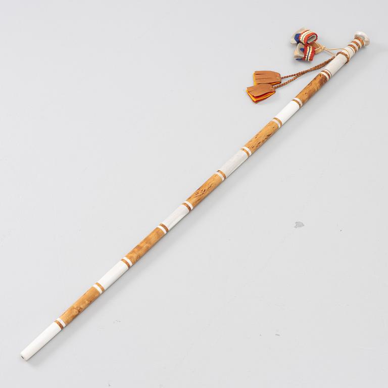 Lars Levi Sunna, a walking stick.