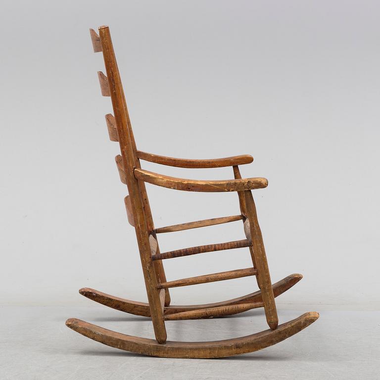 A 18th/19th century rocking chair.