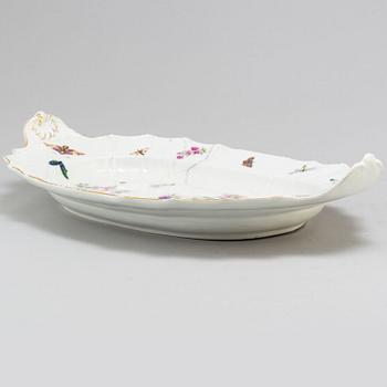 A Meissen porcelain tureen with cover and matching dish, 19th century.