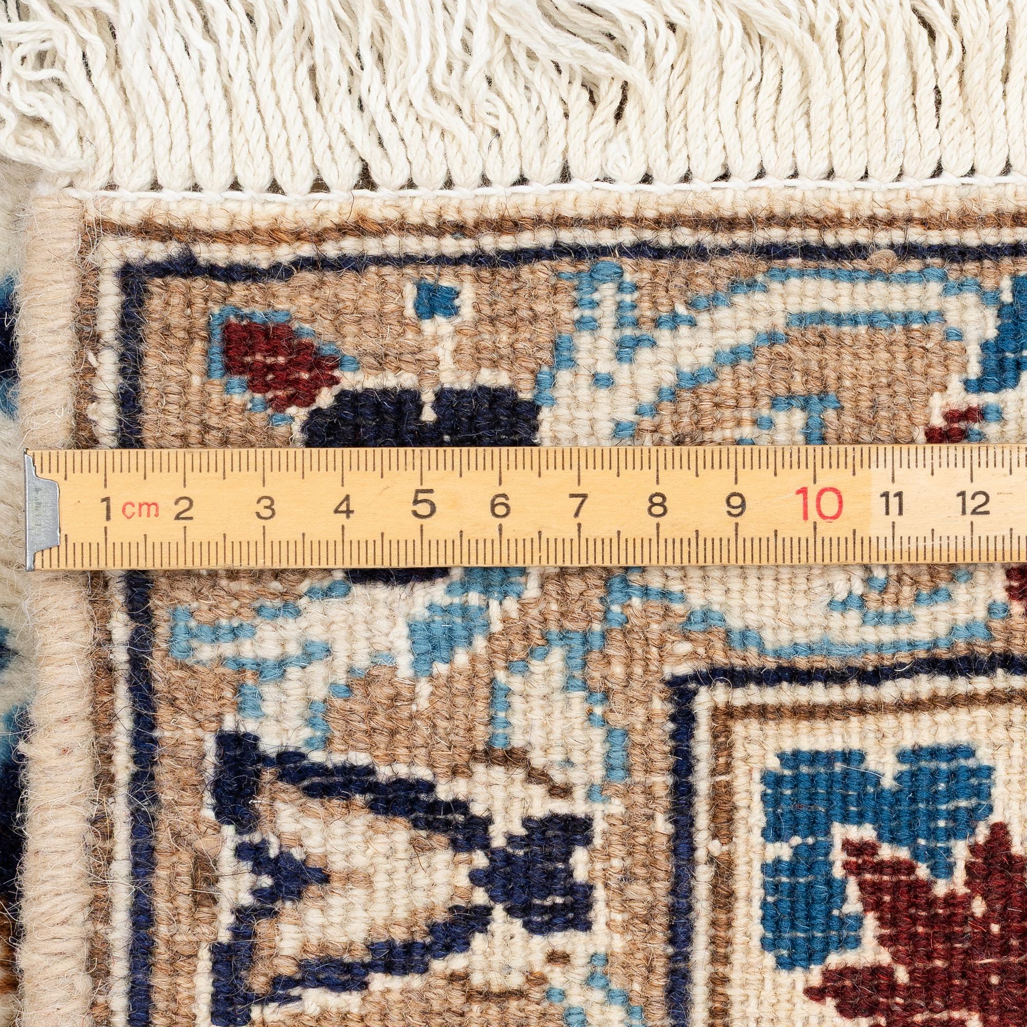 Rug, Nain, approximately 300 x 195 cm.