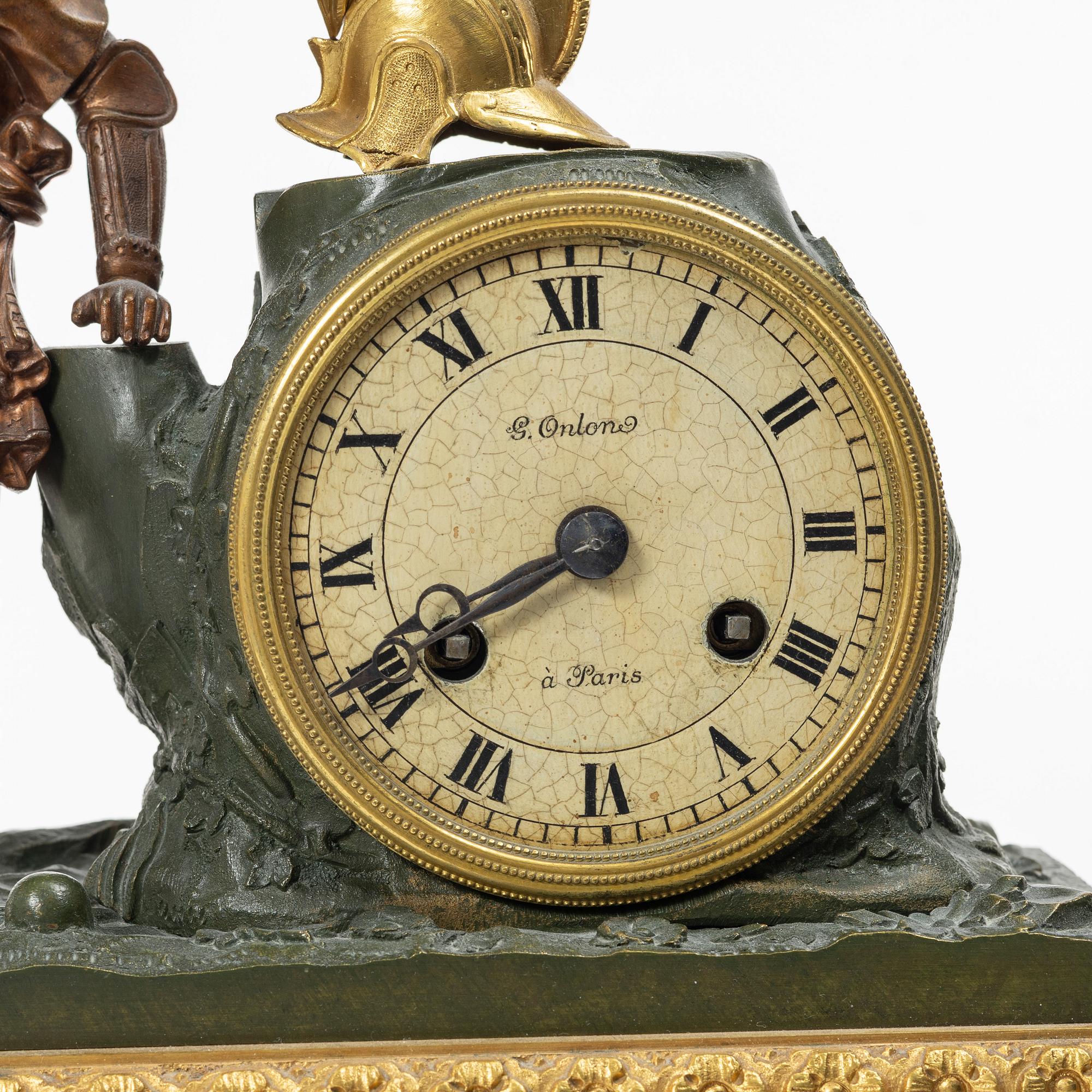 A mantel clock, France, early 20th Century.