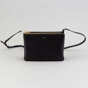 Céline, a black leather 'Trio Bag'.