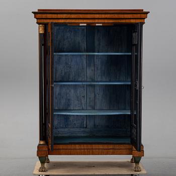 An Empire mahogany cabinet, first half of the 19th Century.