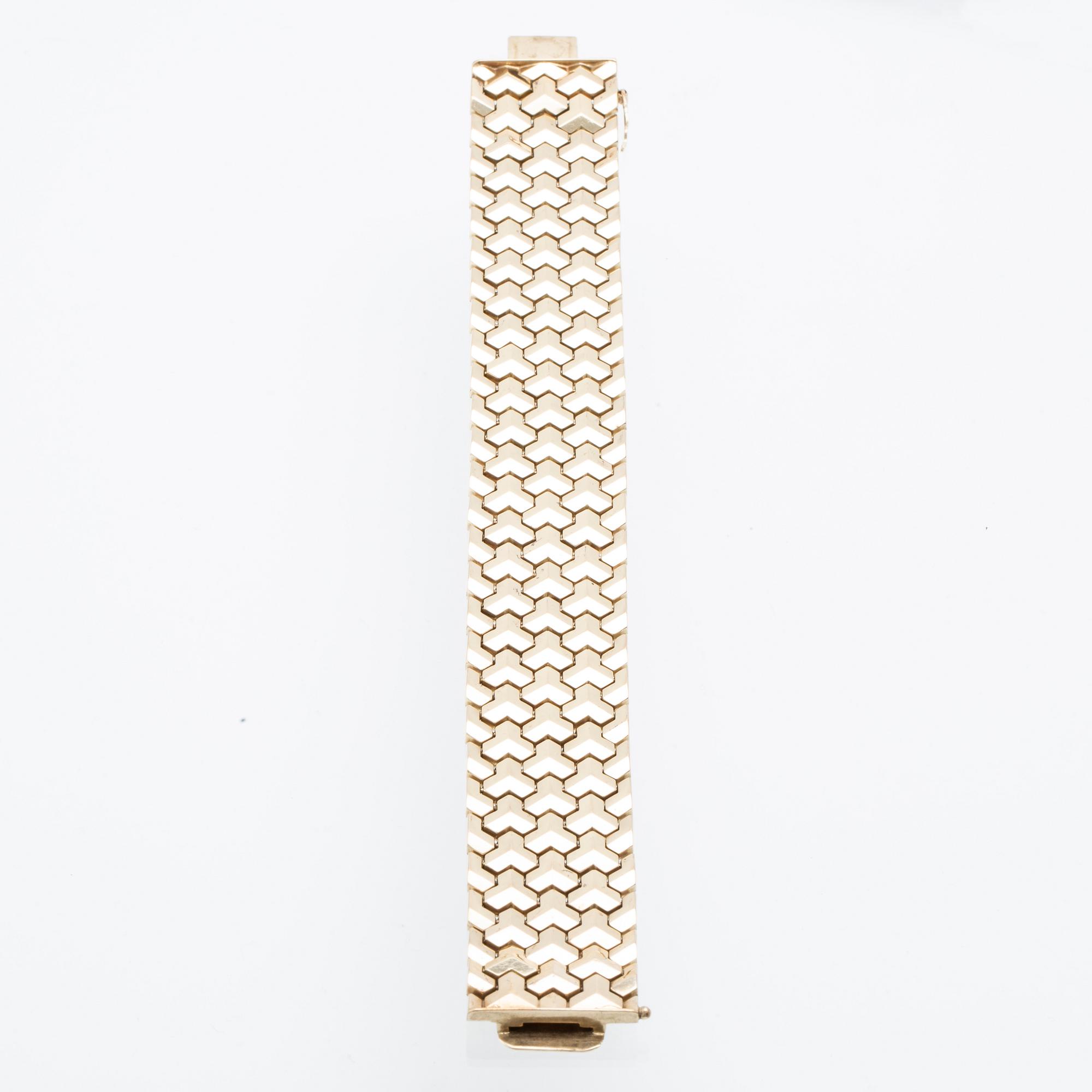 A 14K gold bracelet.