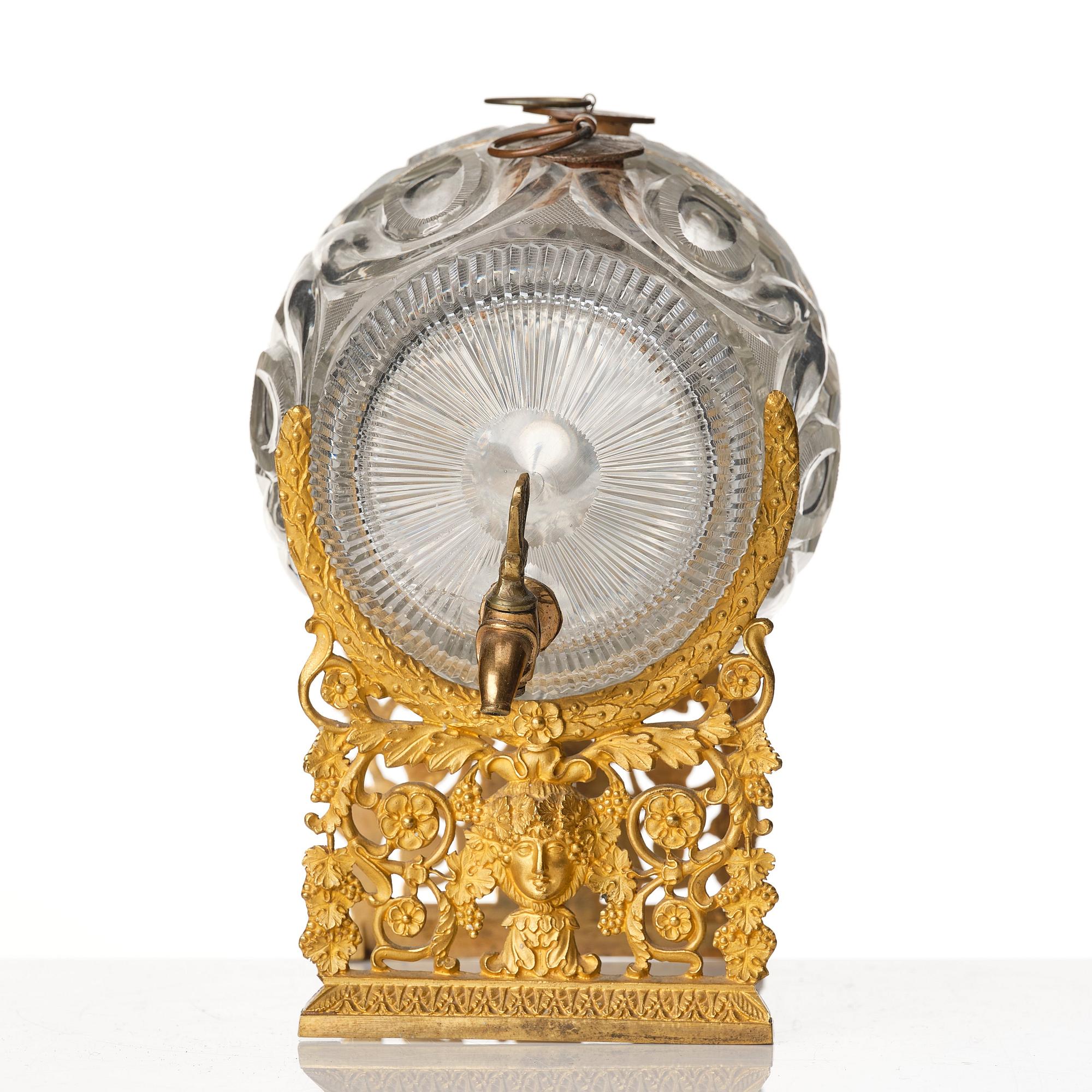 A Empire ormolu-mounted cut glass wine barrel.