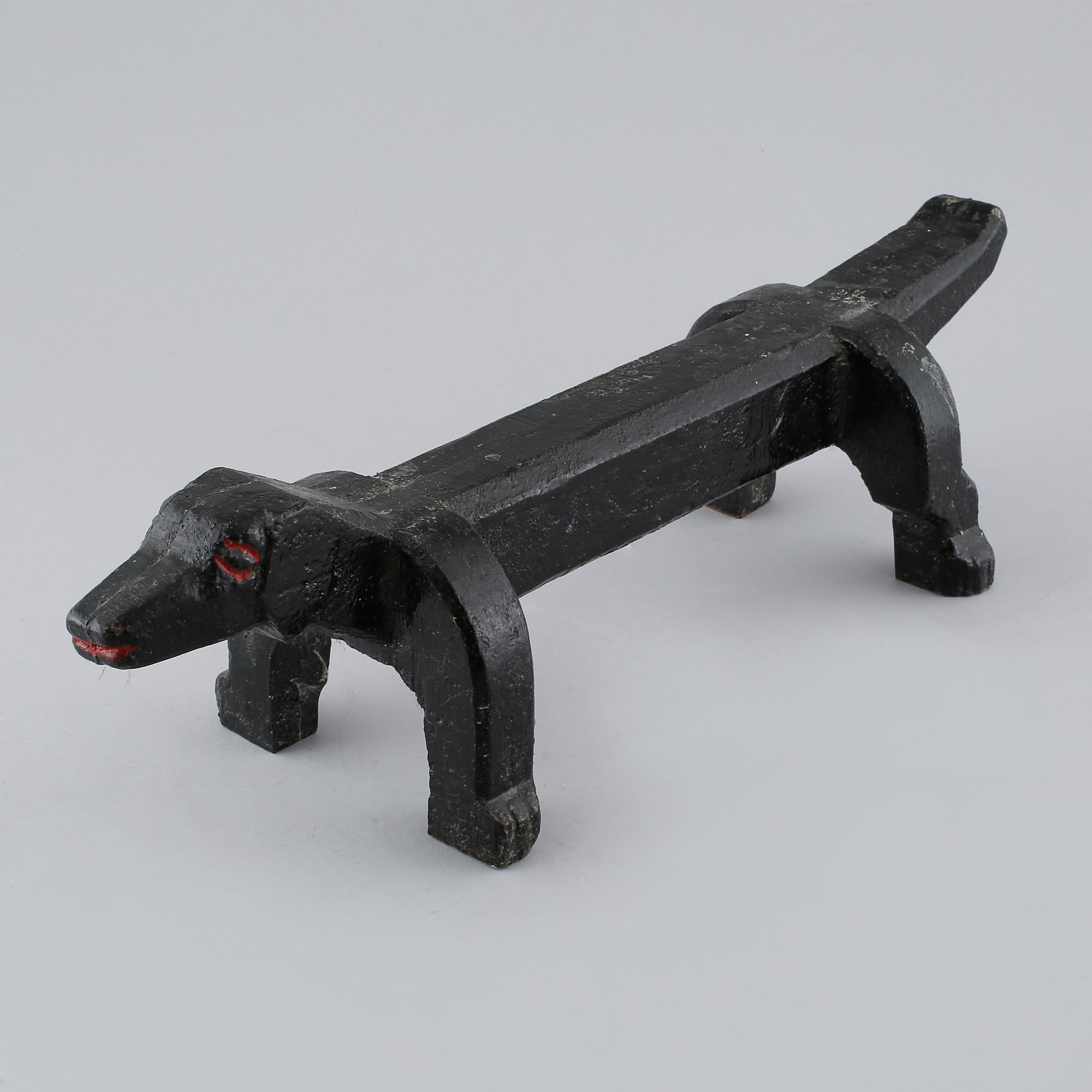 ELDHUND, gjutjärn, 1900-talets andra hälft.