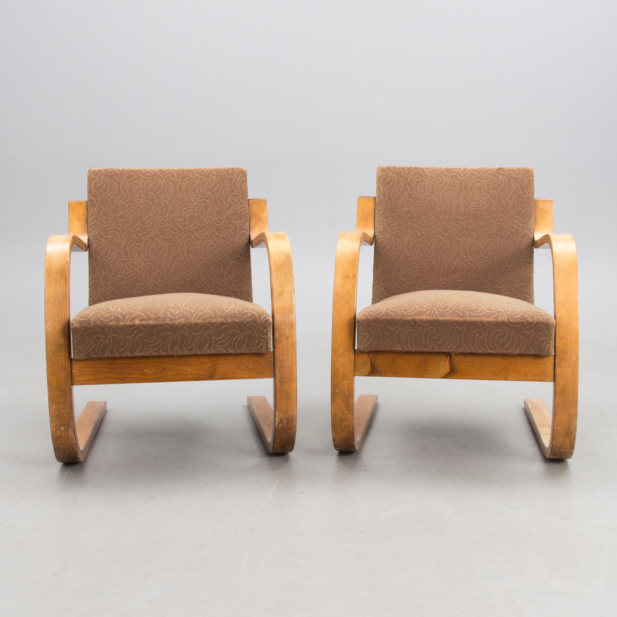 A PAIR OF 1940's ARMCHAIRS NO 34/402, Oy Huonekalu- ja Rakennustyötehdas Ab.