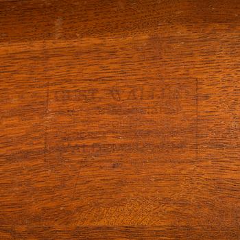 A carved oak sofa, circa 1900.