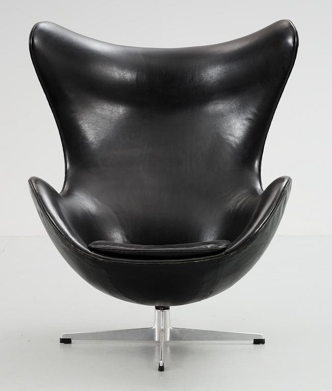 An Arne Jacobsen black leather 'Egg' chair, Fritz Hansen, Denmark 1960's.