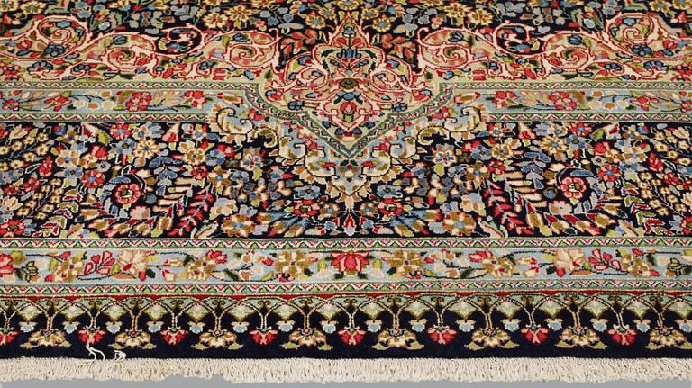 A Kirman Lavar carpet, 'Millefleur', approx. 383 x 300 cm.