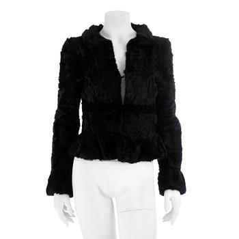 497. UNGARO fuchsia, a black fur coat.Size 42.