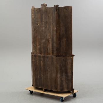 A 19th century corner cupboard.