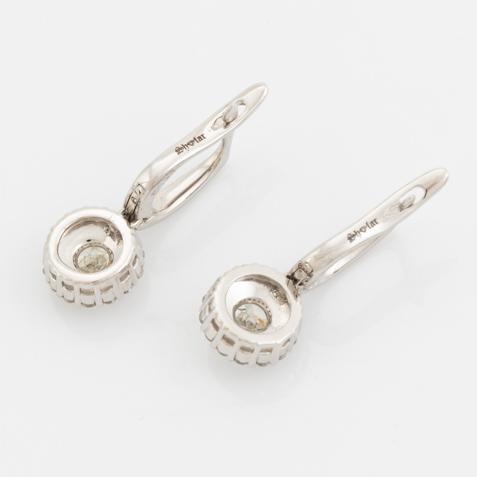 Cushion cut diamond earrings.