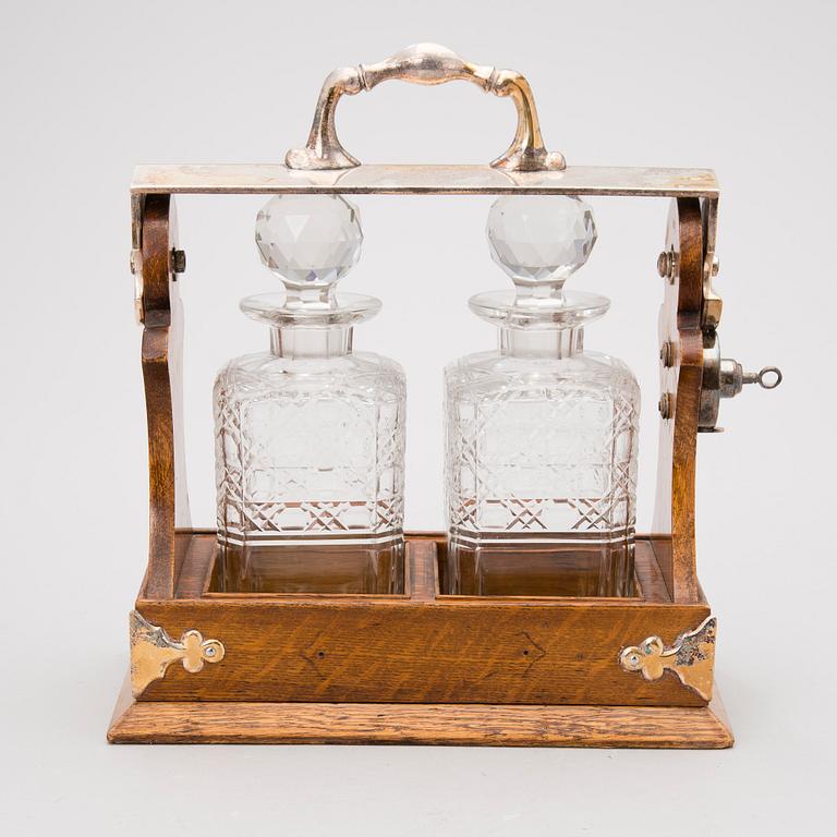 Locking Liquor Decanter Caddy / Two-bottle Tantalus, England 20th Century.