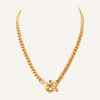 An 18K white and yellow gold necklace set with two cabochon-cut sapphires Italy 1980s.
