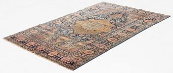An antique Kashan 'Mohtasham' rug, c. 206 x 131 cm.