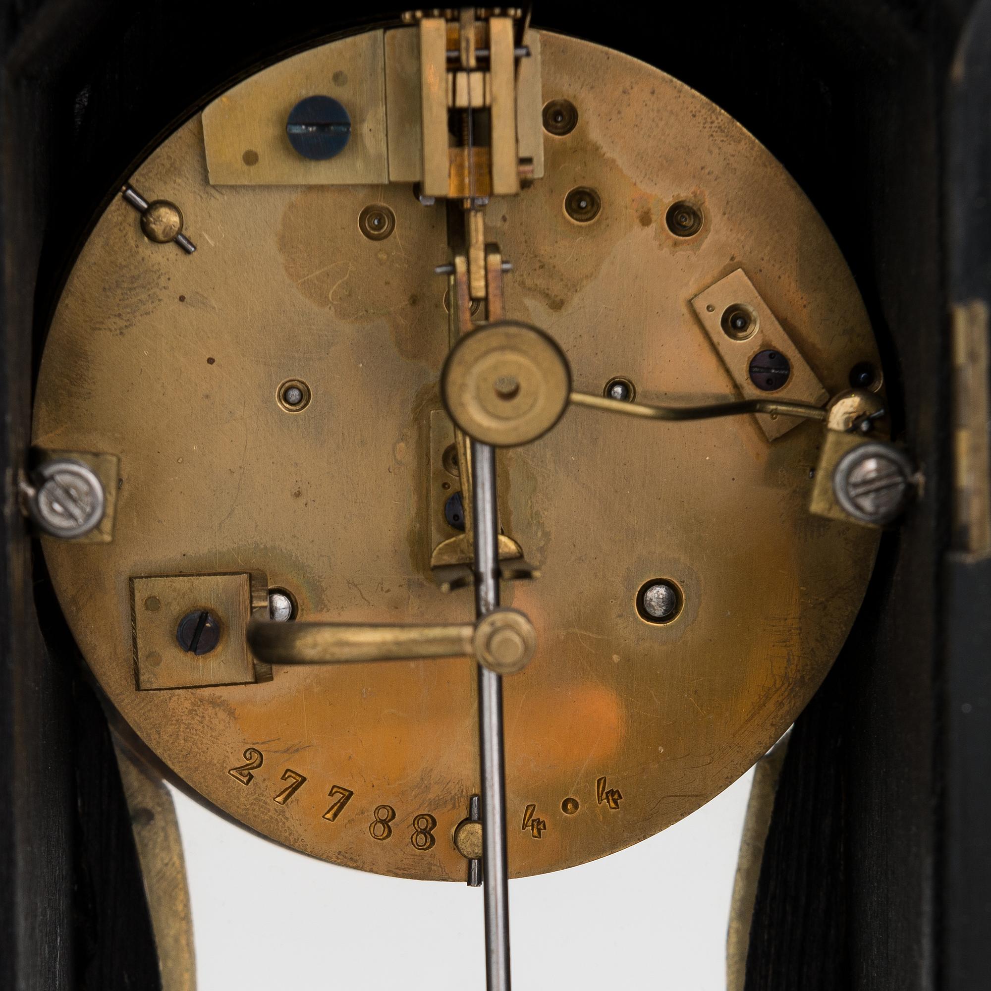 A French boulle style mantel clock, late 19th Century.