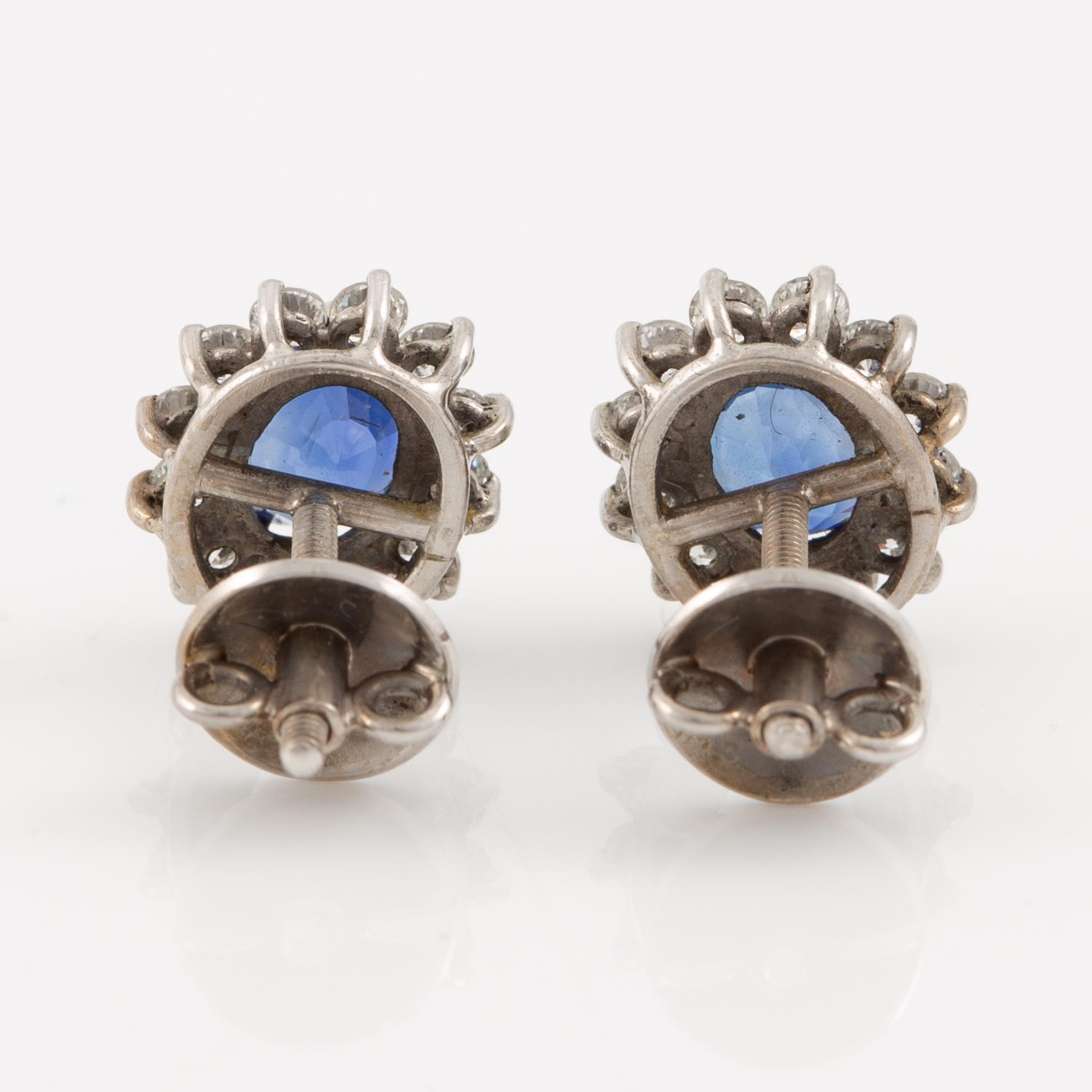 Earrings, a pair, 18K white gold with sapphires and brilliant-cut diamonds.