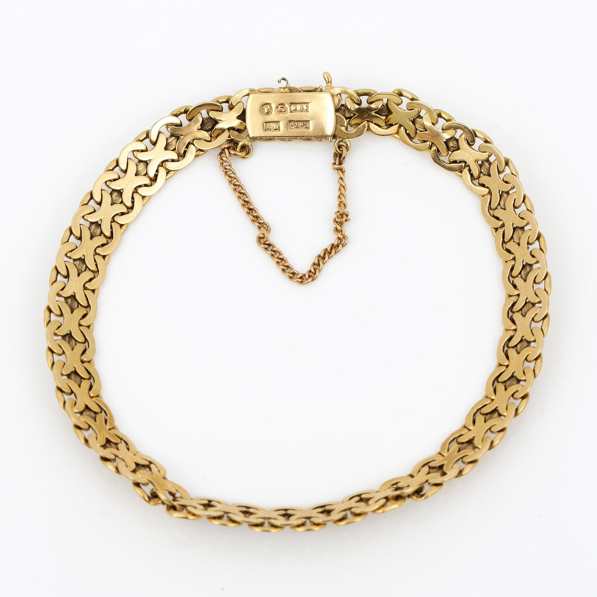 ARMBAND, 18K guld, Thulins Eftr Urhandels, Stockholm, 1936. Vikt ca 13,45 g.