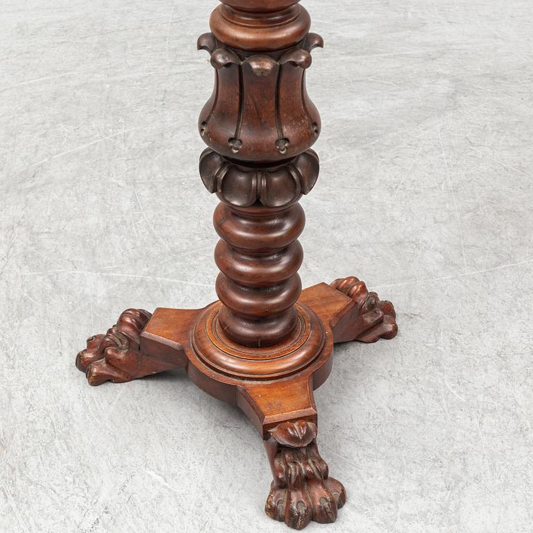 A mahogany pedestal, probably England, first half of the 20th century.