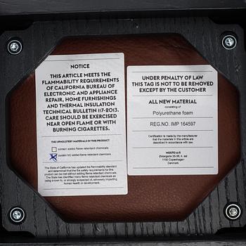 Four contemporary leather upholstred stools by Berlin & Iskos for Muuto.