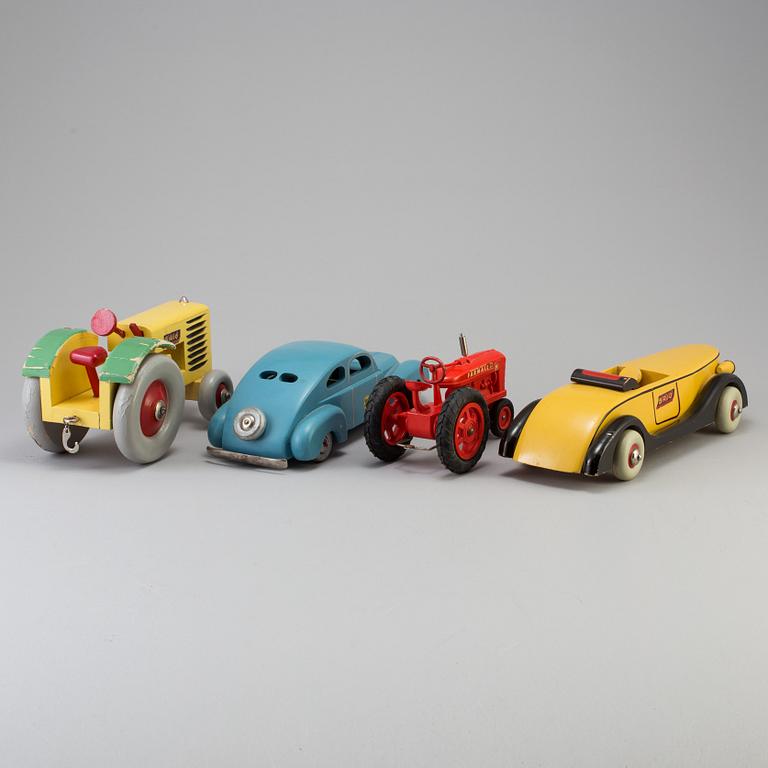 Four wood and plastic toys, Brio and Luck, Sweden, mid 20th century.