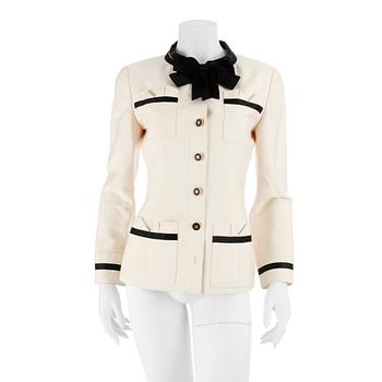 CHANEL, a black and white silk jacket.