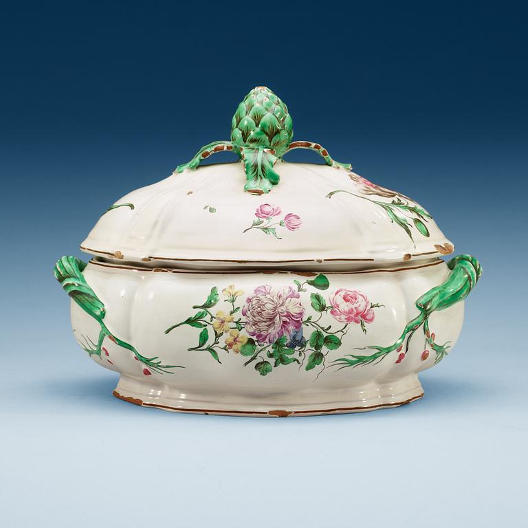 An unmarked faience tureen with cover, 18th Century.