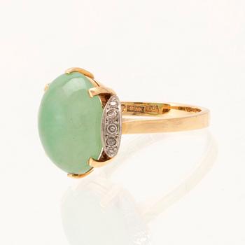 Börje Löfgren, ring in 18K white and red gold with an oval cabochon-cut jadeite and single-cut diamonds, Stockholm 1964.