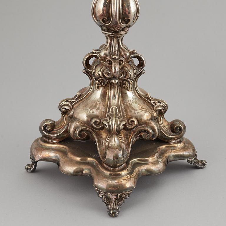 A pair of barocque style nine lights candelabra, silver plate, 20th Century.