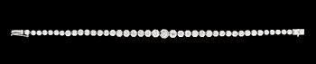 620. A white gold and diamond bracelet.