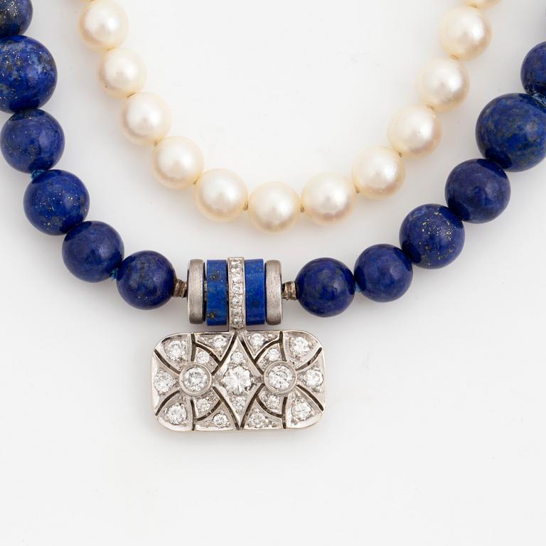 A Gaudy clasp and two necklaces.