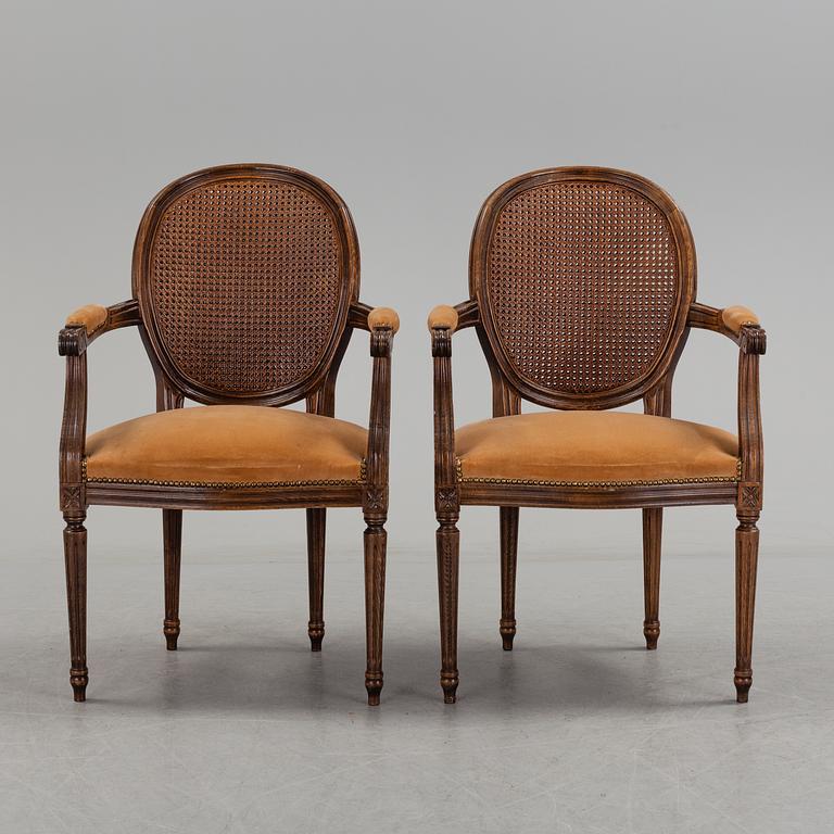 A pair of Gustavian style armchairs, second half of the 20th Century.