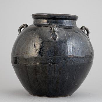 A Chinese stoneware black glazed jar, presumably 17th century or older.