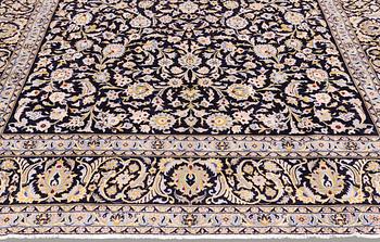 A carpet, Kashan, signed, ca 410 x 292 cm.