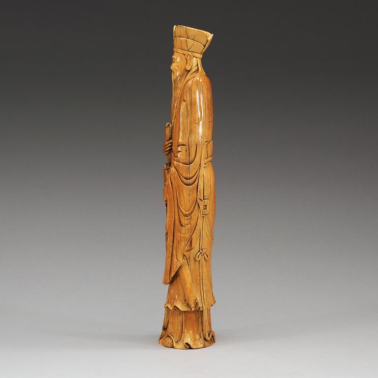 A carved ivory figure of one of the immortals, China presumably early 20th century.