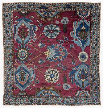 An antique rug, north-west Persian, so-called Vaghire, approx. 136 x 134 cm.