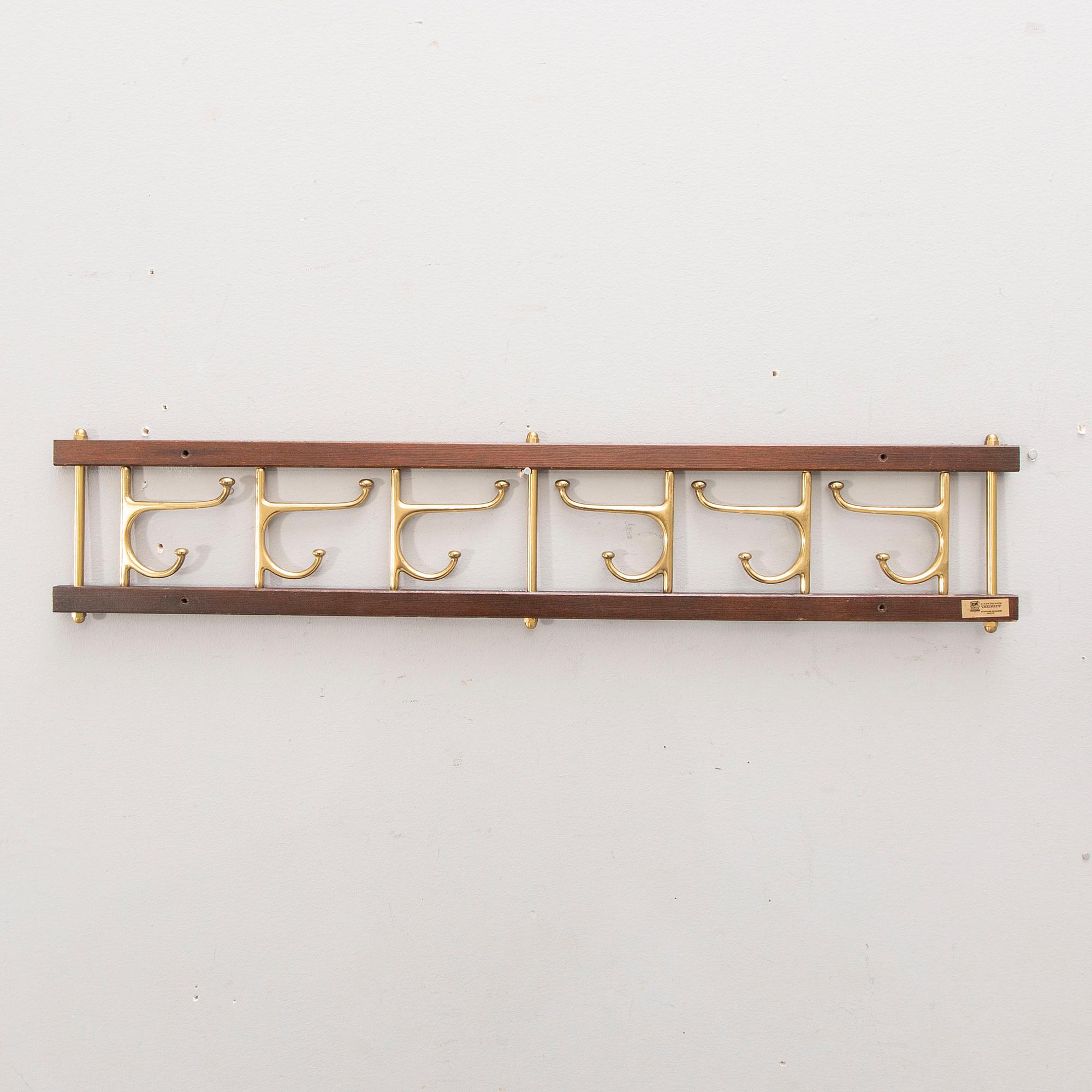 Klädhängare, "Dekorativ", AB Skogslunds metallgjuteri, Anderstorp, 1900-talets mitt.