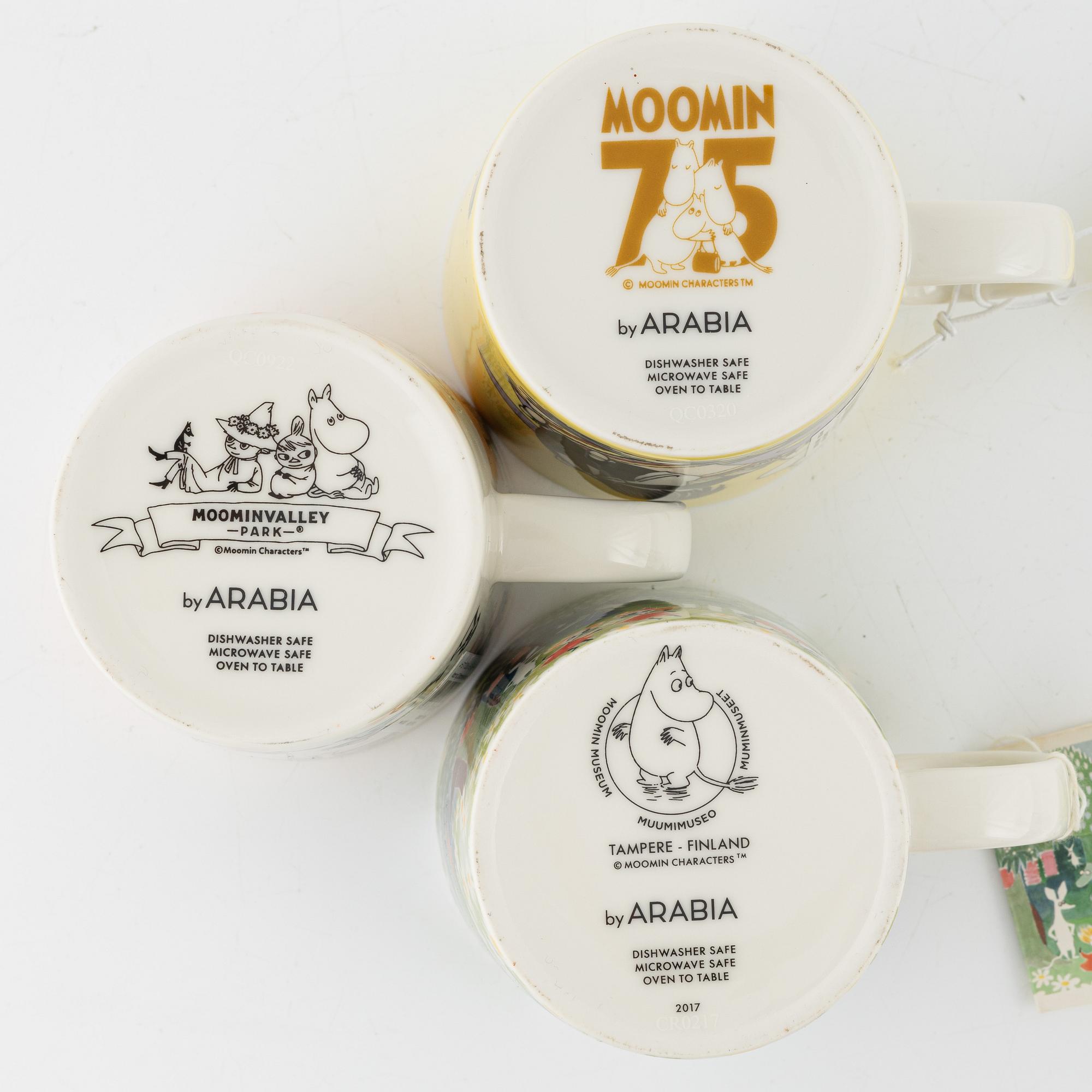 Eleven porcelain Moomin mugs, Arabia, Finland.