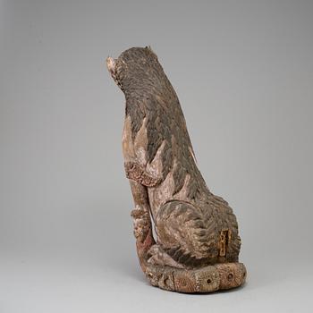 A wooden mythical beast, Southeast Asia, early 20th Century.