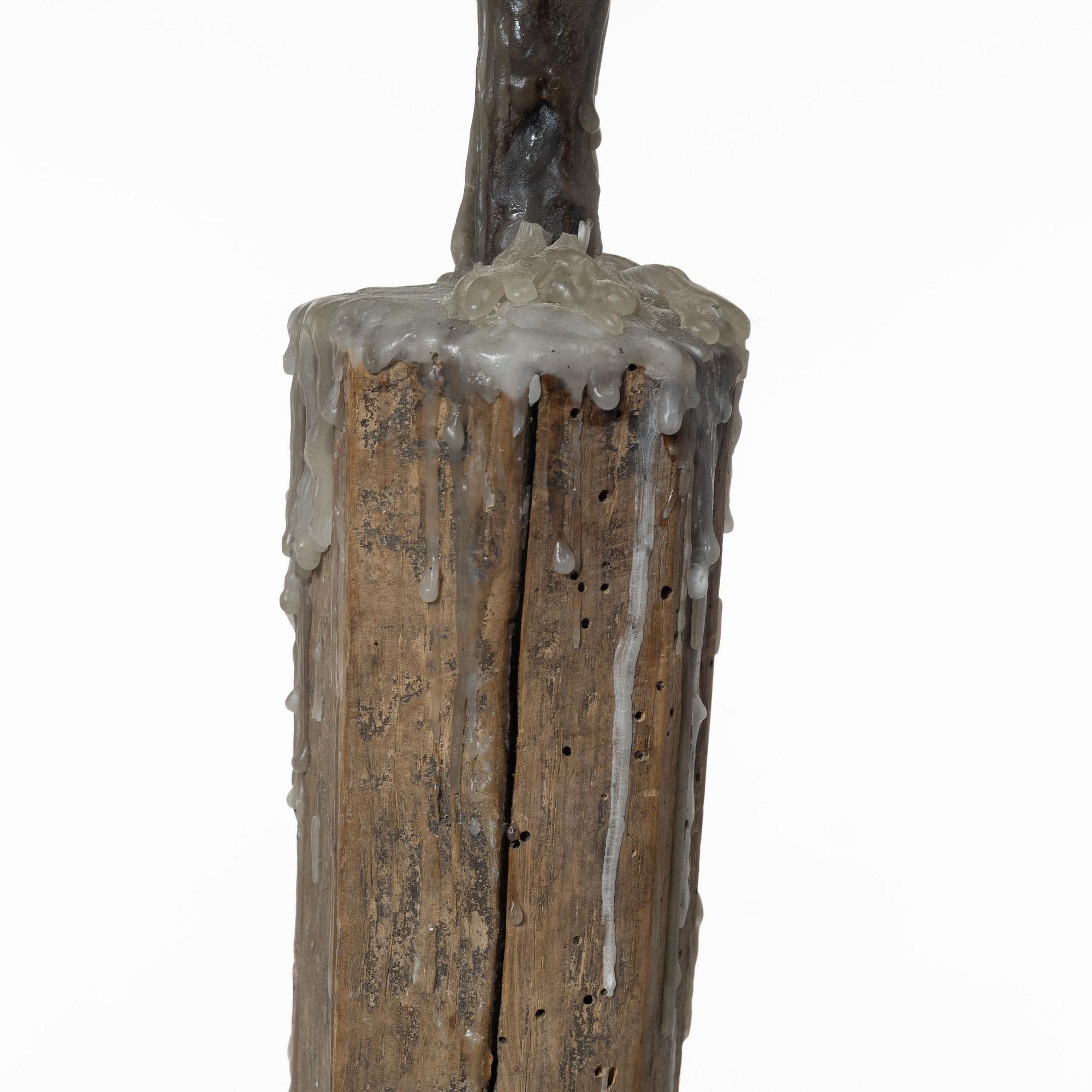 A candle stick, 19th/20th Century.
