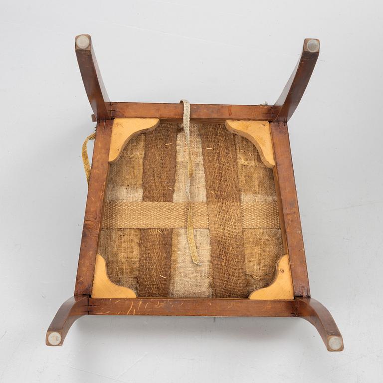 A set of four Empire chairs, first half of the 19th Century.