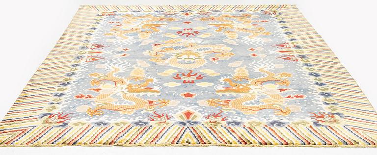 A semi-antique chinese ' Five dragon' silk carpet, c 335 x 254 cm.