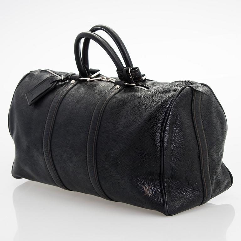 Louis Vuitton, a 'Keepall 50 Taurillon' leather weekend bag.