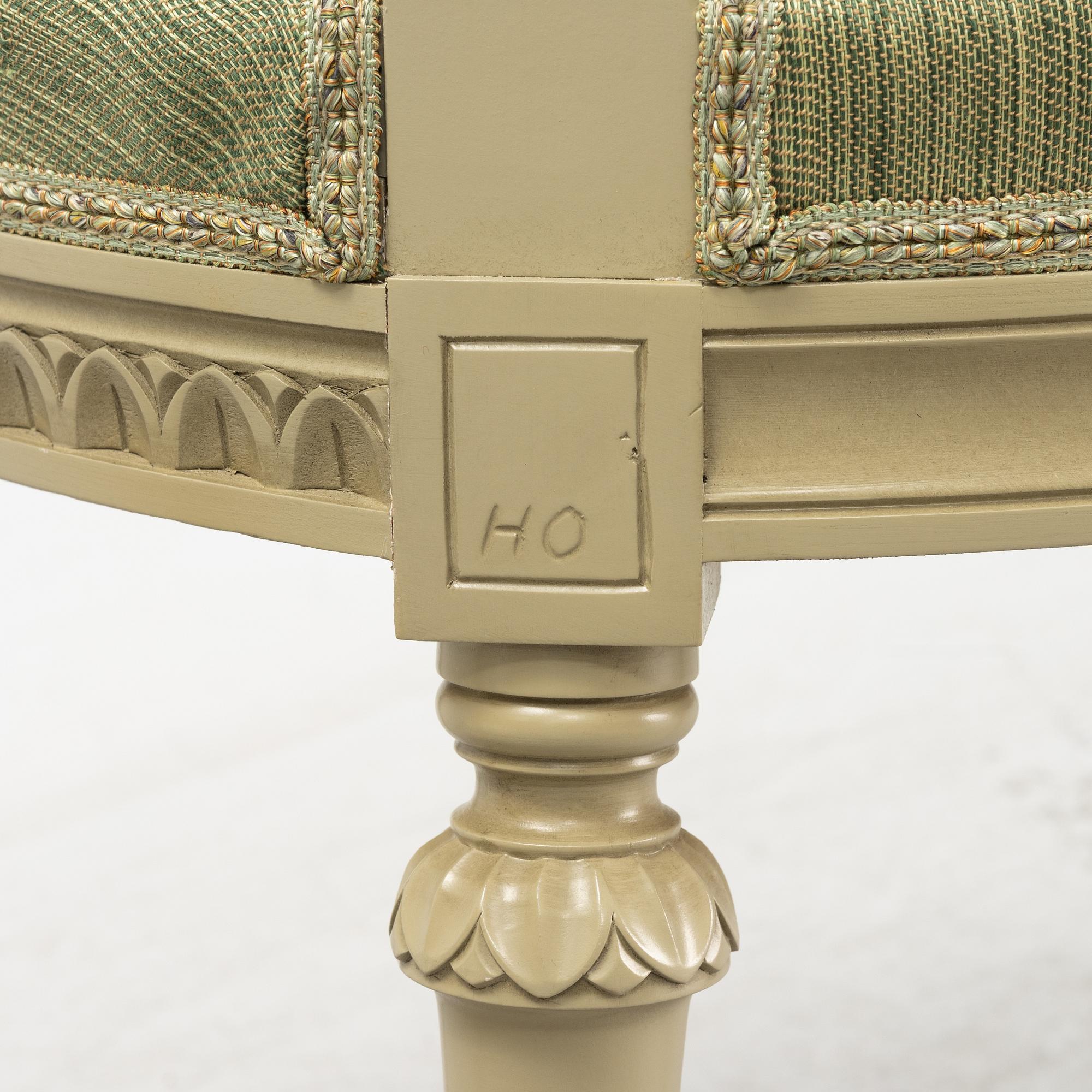 A Gustavian dining table with six chairs. Åmells dated 1974.