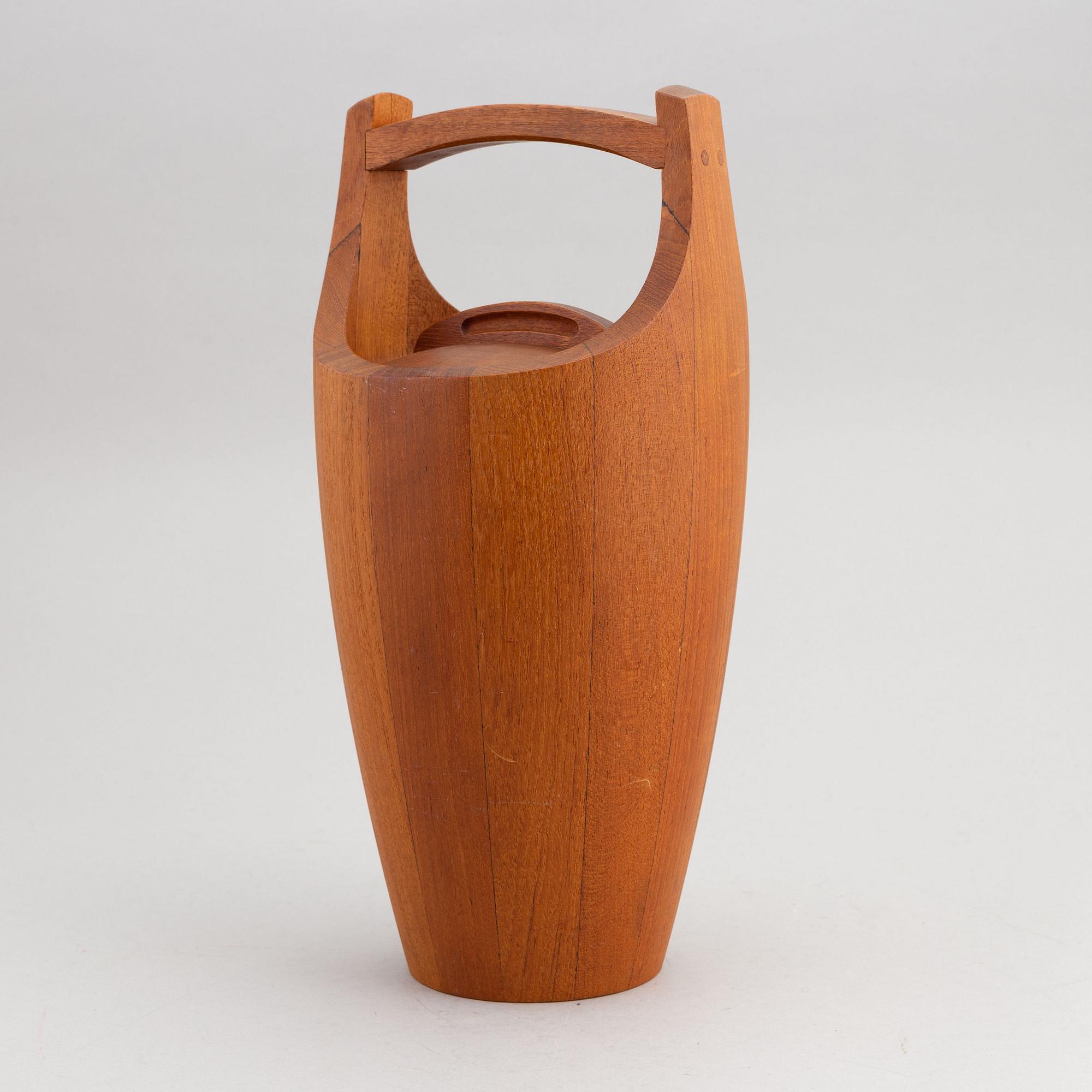 A 1950s 'Congo' teak ice bucket by Jens Quistgaard, Dansk Designs, Denmark.