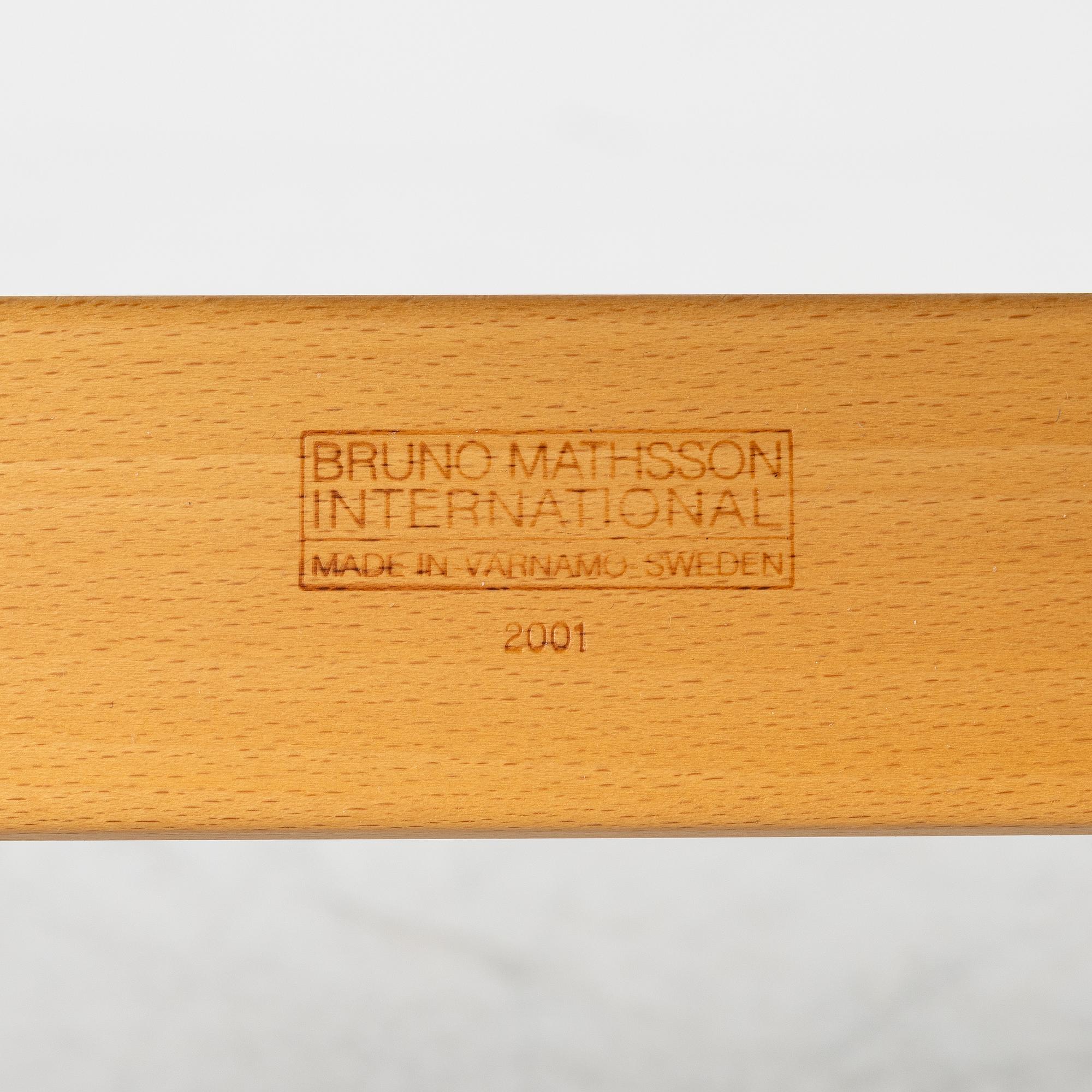 Bruno Mathsson, a 'Miranda' armchair and ottoman, Bruno Mathsson International, Värnamo, 2001.